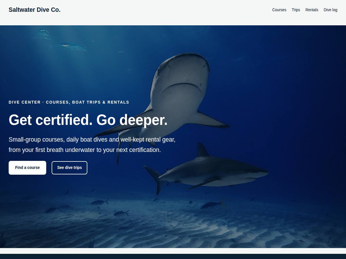 Reefline theme home page: an underwater photo of two reef sharks with the headline Get certified. Go deeper.